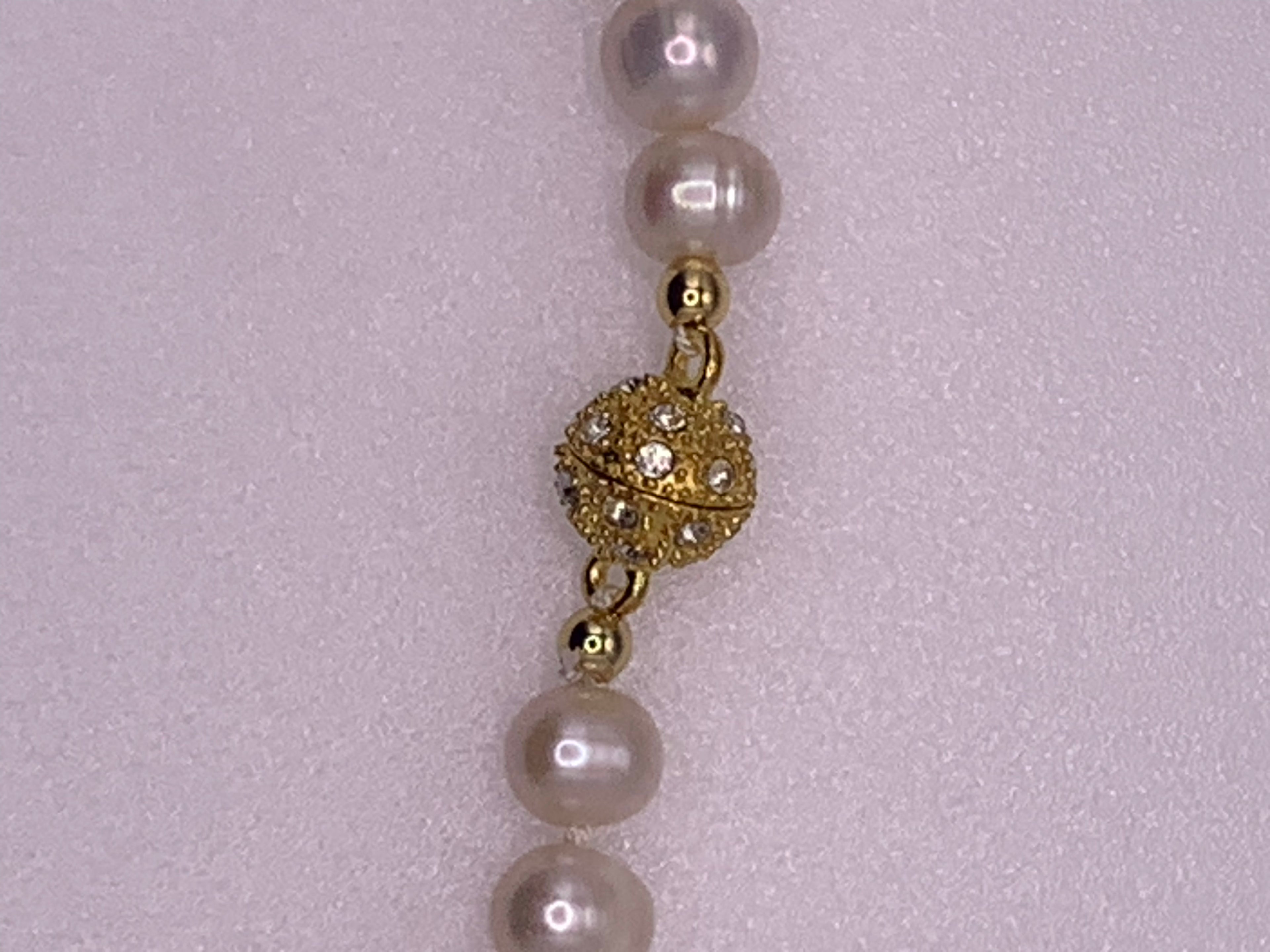 Gold and White Pearl Necklace