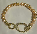 AA+ grade pink freshwater hand-knotted pearl bracelet with gold accents