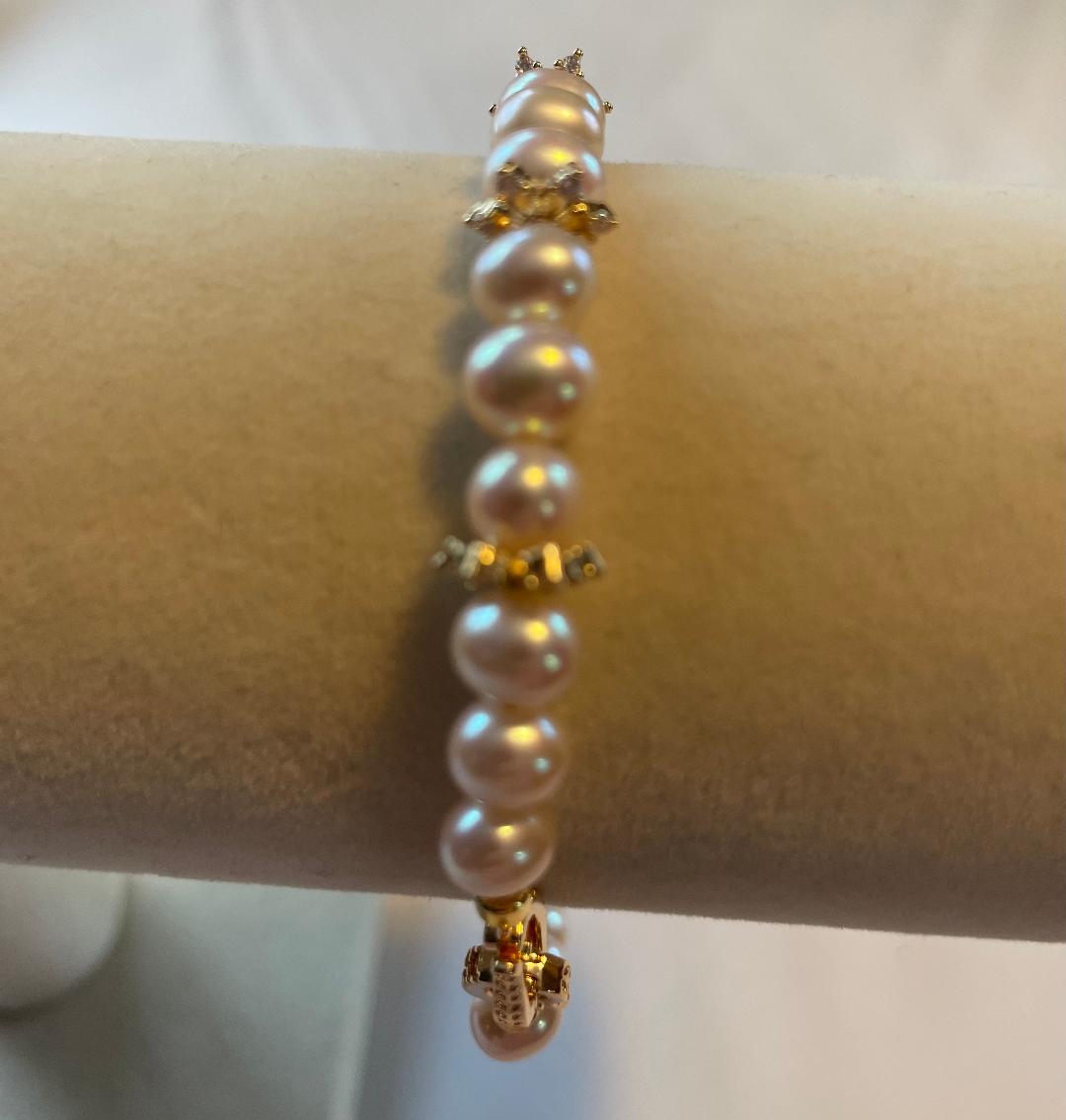 AAA grade freshwater pearl bracelet with 14k gold snowflake accents